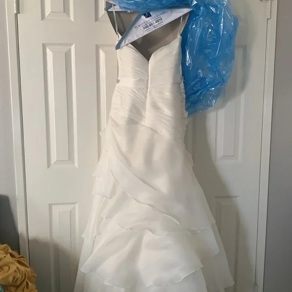 Beautiful off white Demtria cascading wedding dress.  Size 10, but altered. - Picture 7 of 12